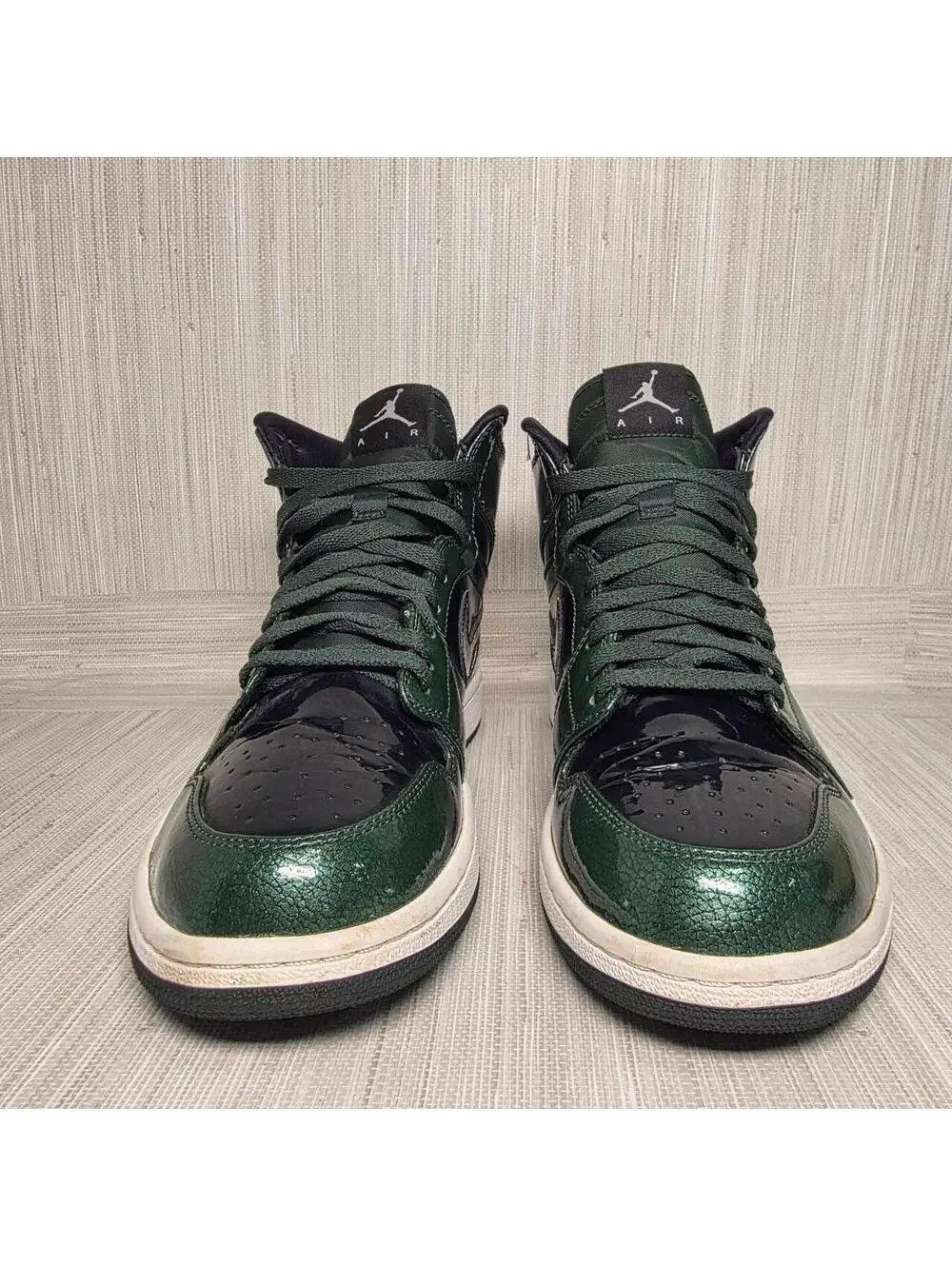 Nike Air Jordan 1 Retro High OG green trainers.